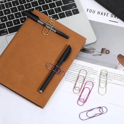 Heart-shaped paper clip – Holds a pen