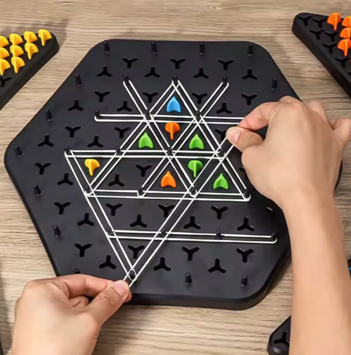 Triangle Hunter: A Board Game for Logic and Geometry Training