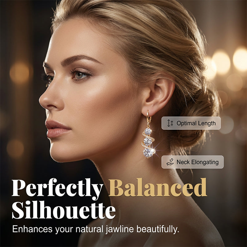 Asymmetrical spiral and teardrop earrings